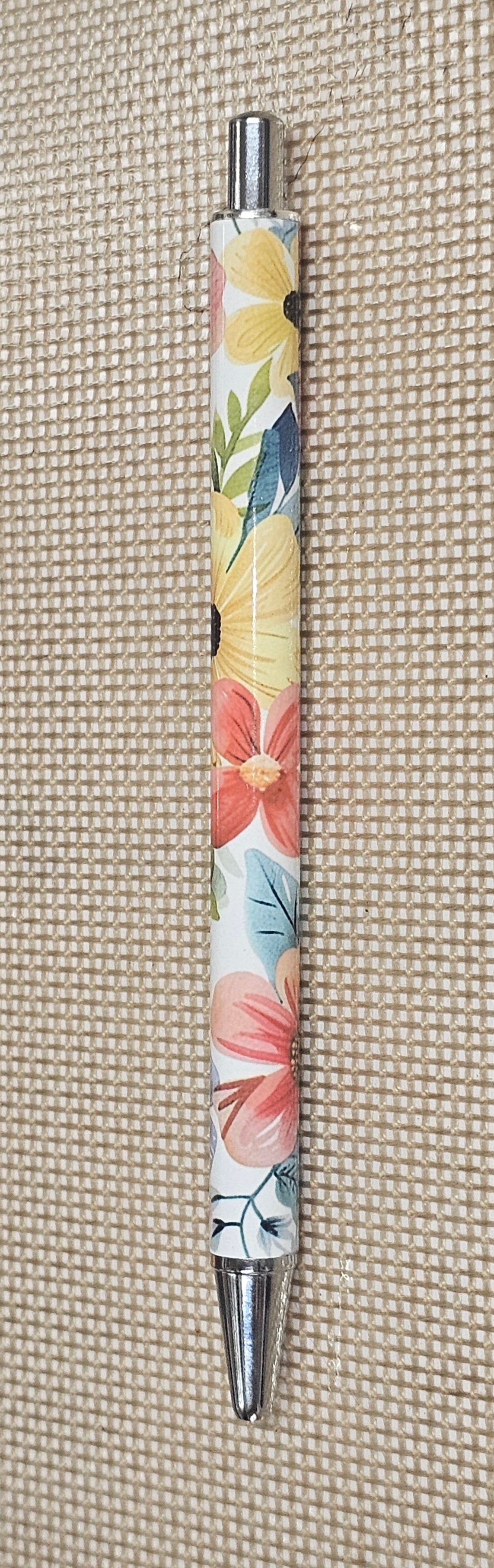 Yellow, orange and blue floral pen