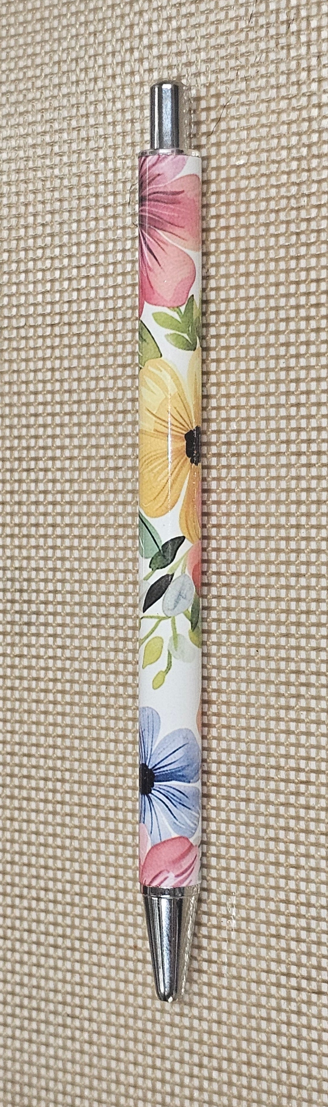 Yellow, orange and blue floral pen